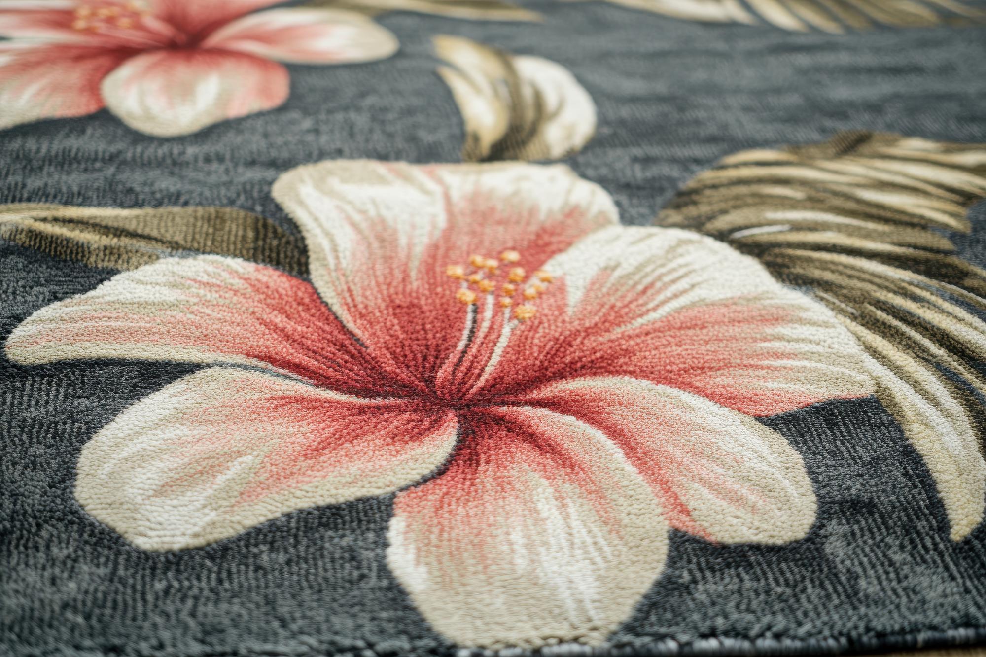 Close-up of modern embroidered floral motif on linen
